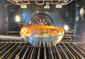 Photo of Gruyère puff in the oven.