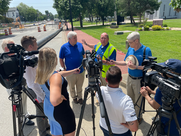 Photo of Vic Kelson and Justin Guetling at a May 15 press conference discussing the sinkhole on Riverside Drive by Jodi Keen
