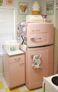 Photo of a a pale pink ‘50s-era Big Chill refrigerator by Brodie Curtsinger