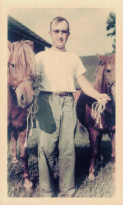Photo of Nikki's grandfather, J.C. Brettin, on a farm provided by Nikki Davis