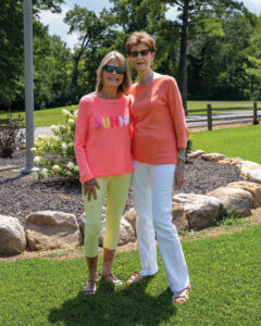 McCutchanville Garden Club President Martha Schriver and Margaret Miller in front of the spruced up landscaping around the flagpole in McCutchanville Coimmunity Park. Photo by Alli Wuertz.