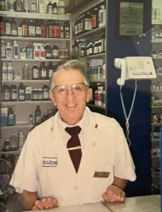 Photo of Mickey Kor at work as a pharmacist in Terre Haute, Indiana, provided by Alex Kor