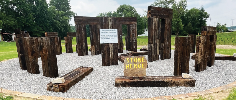 A wooden replica of Stonehenge is installed at Daylight Sculpture Garden in Daylight, Indiana.