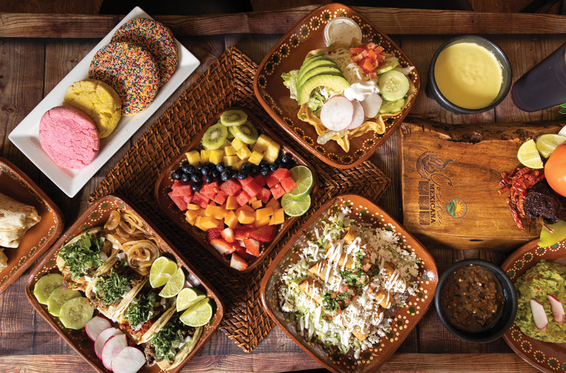Latin American food displayed on top of a table