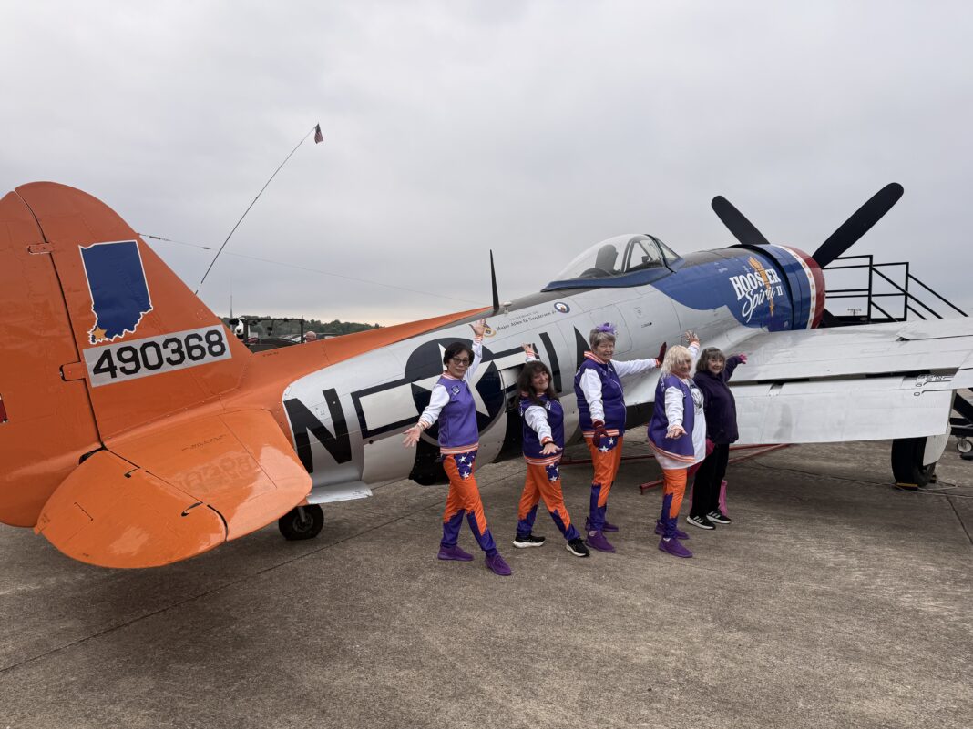 Photo of Silver Ace dancers Insook Beach, Elissa Inez Bakke, Mary Barron, Susie Woods, and Susan Feller at the 5K on the Runway. Insook and Elissa are going to Washington, D.C., along with Erin Lewis (not pictured) and Amy Mangold (not pictured)